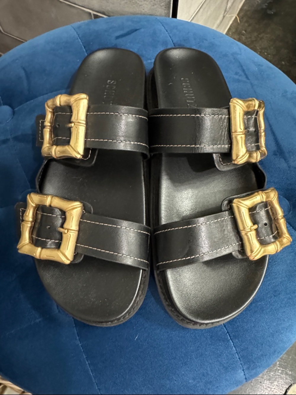 SCHUTZ Black Sandal Slides with Gold Buckle Accents